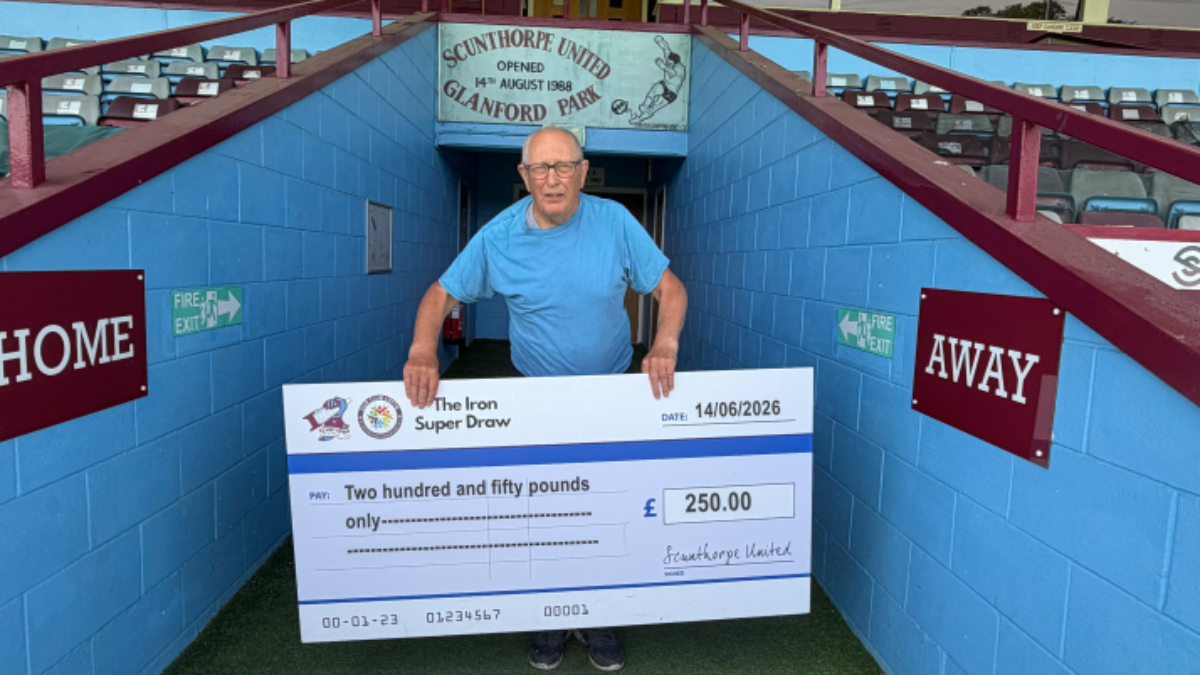Kenneth Benson collects June Iron Super Draw cash prize